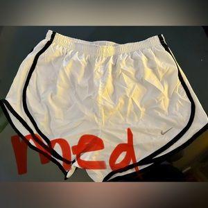 White Nike shorts